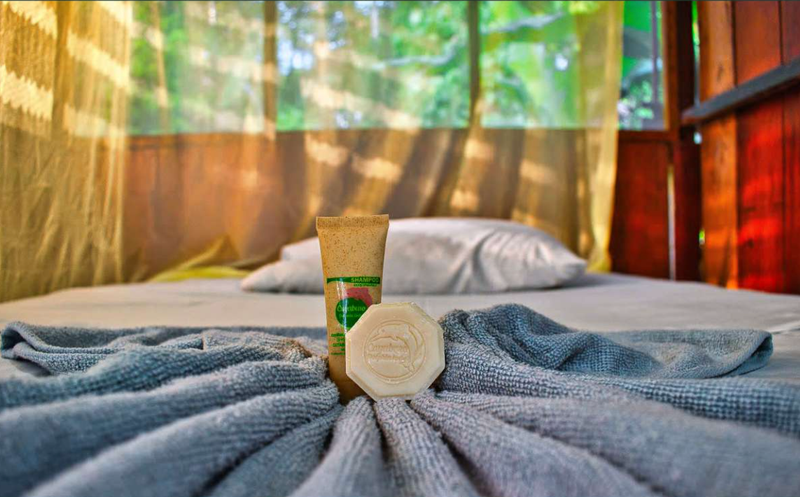 Comfortable beds with amenities at Cuyabeno Dolphin Lodge