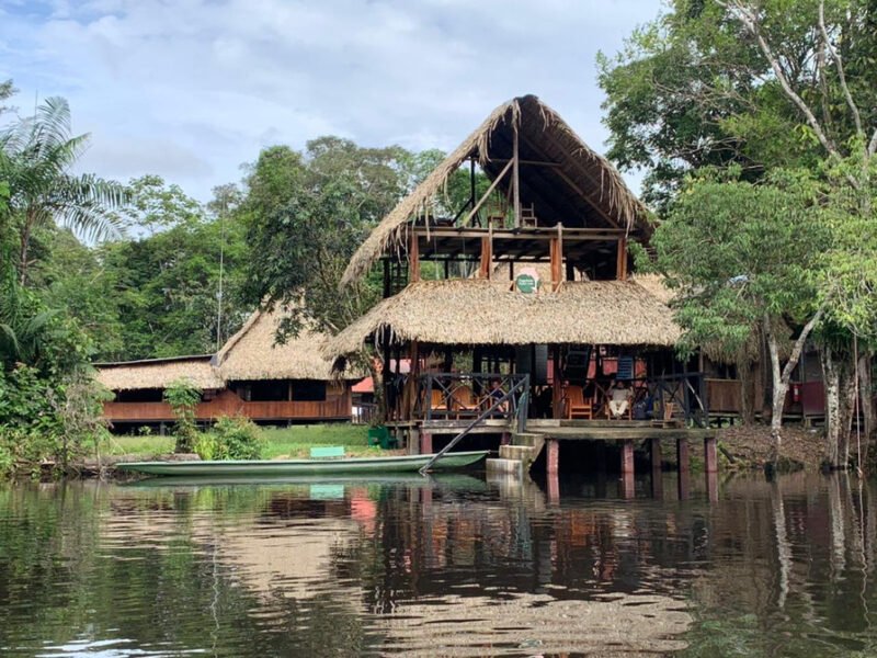 Main house of Cuyabeno Dolphin Lodge on the riverbank
