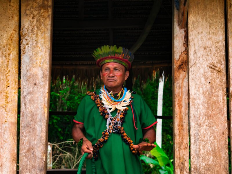 Siona shaman sharing ancestral knowledge in his community, Cuyabeno